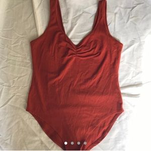 Burnt orange bodysuit 🍊